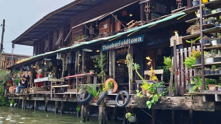 3 Hrs Private boat Tour Bangkok Floating Market by Flat Boat - Wat Pak Nam’s 69-meter Buddha and glass pagoda