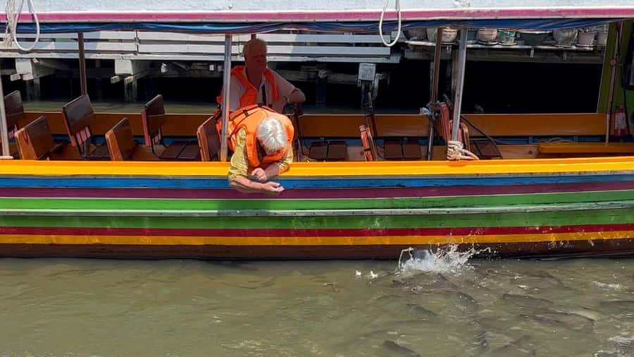 3 Hrs Private boat Tour Bangkok Floating Market by Flat Boat - Side canals, fish feeding, and unhurried photo stops