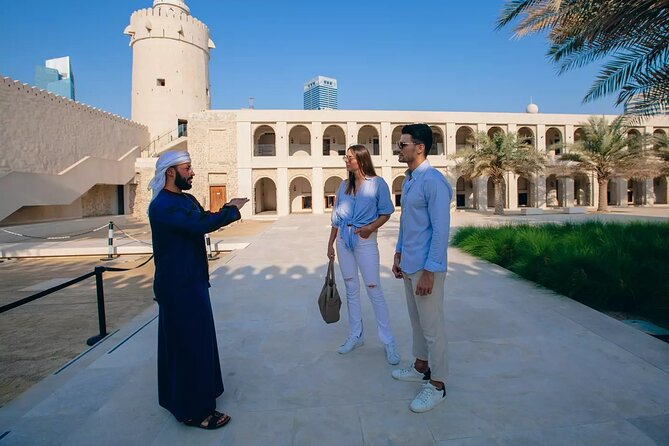 Abu Dhabi City Tour: Grand Mosque, Palace, Souk, Louvre & Ferrari - Dates Market and Heritage Village: the day’s more grounded stops