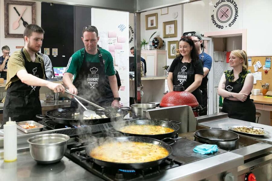 Alicante: Paella & Sangria Class with Tapas and Market Visit - Cooking in a working local restaurant