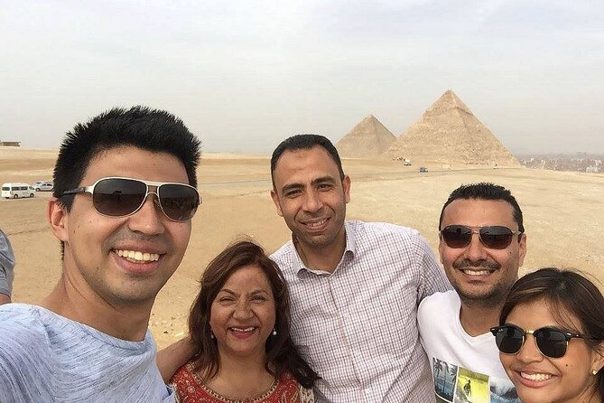All Inclusive Day tour 8hrs Pyramids, Egyptian Museum and Khan Al-Khalili bazaar - Reading the Egyptian Museum with a guide