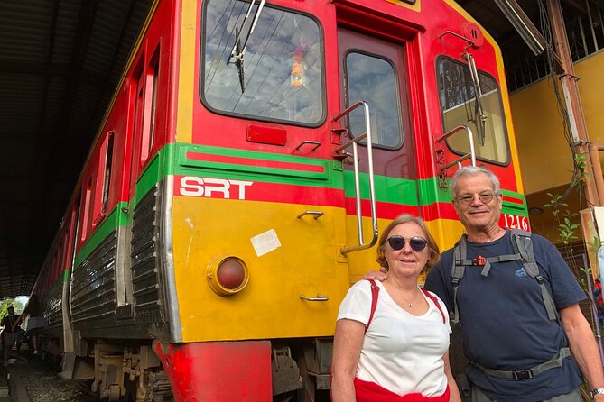 Amphawa and Railway Markets with Boat Ride Group Tour - Wat Bang Kung and the chapel held by Banyan roots