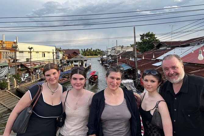 Amphawa and Railway Markets with Boat Ride Group Tour - Amphawa after dark: food, canals, and wooden shopfronts