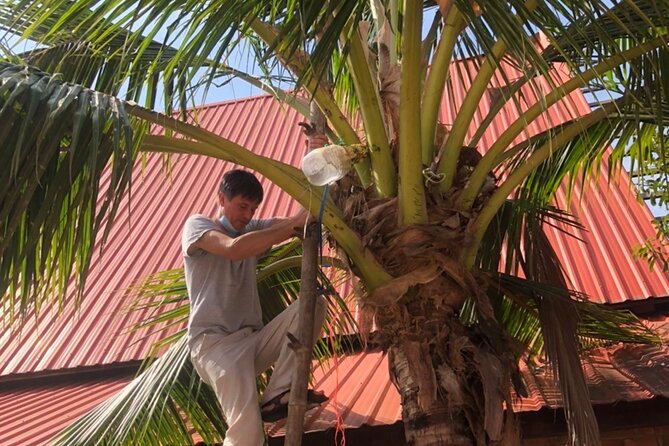 Amphawa Boat Ride & Railway Market: Multi-Lang Private Tour - Wat Bang Kung and the banyan-wrapped chapel