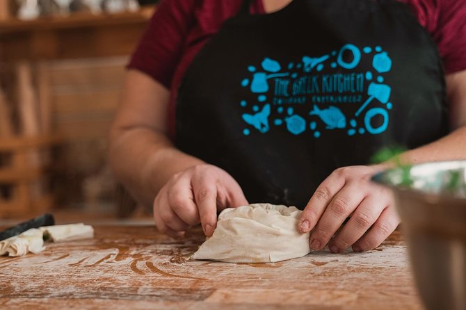 Athens: Classic Cooking Class with Market Visit and Wine - Rolling spanakopita and dolmades