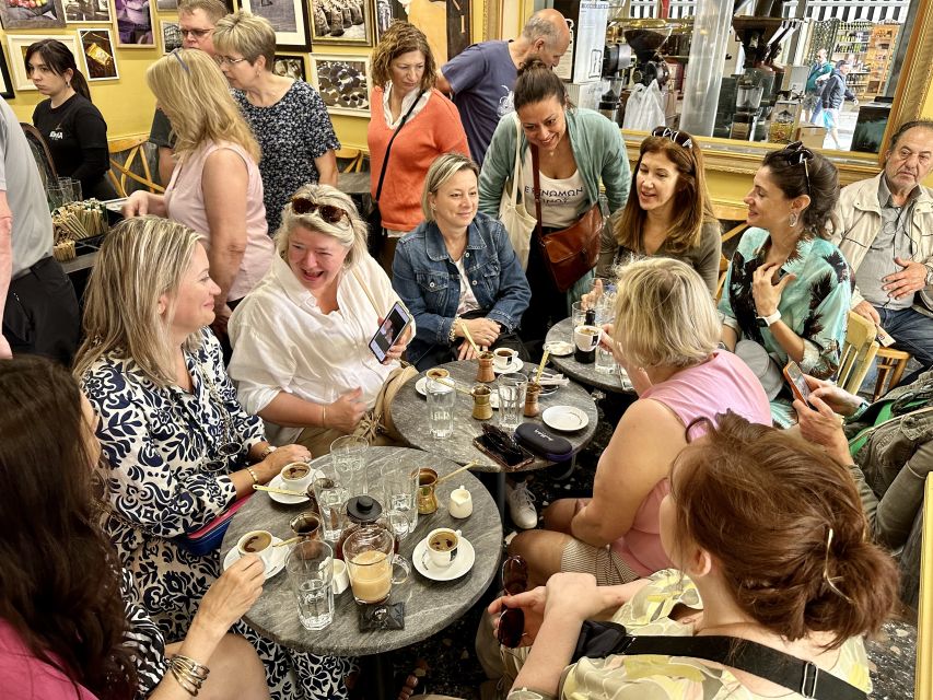 Athens: Greek Food Tasting and Market Walking Tour - Sitting down to stuffed vegetables, sardines, and moussaka