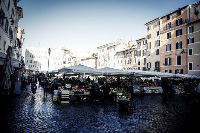 Authentic Roman Cooking Class & Market Experience - A private kitchen with several chefs in the mix