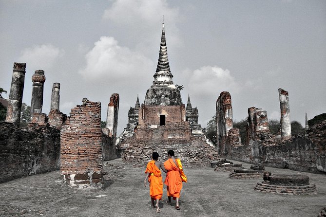 Ayutthaya Sunset Tour: Iconic Temples & Scenic River Boat Ride - Transport, group size, and the risk of delays