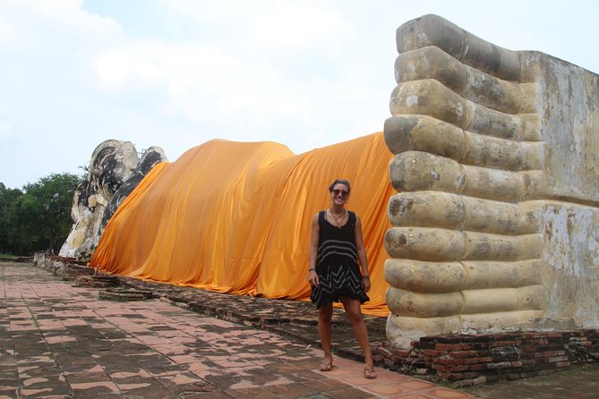 Ayutthaya Sunset Tour: UNESCO Temples & Peaceful River Cruise - Wat Mahathat and the Buddha in the roots