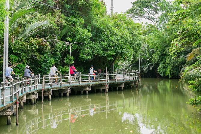 Bangkok Cycling Tour Khlong Toei Market and Bang Krachao Island - Tuk-tuk and ferry: two short rides that matter