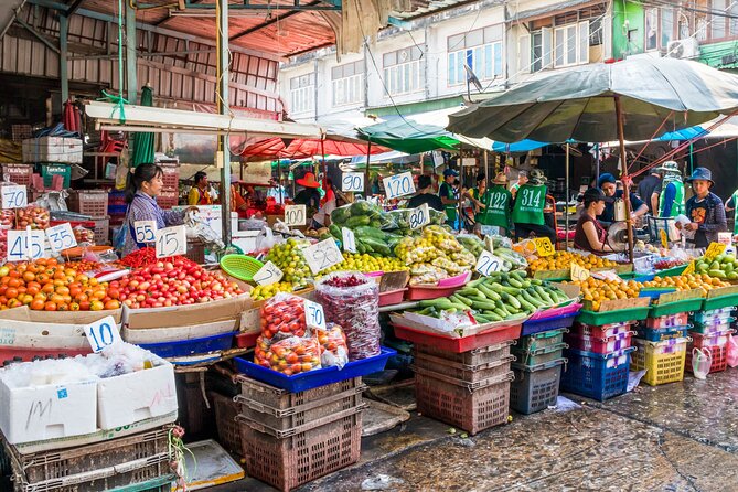 Bangkok Cycling Tour Khlong Toei Market and Bang Krachao Island - A park stop and fish feeding