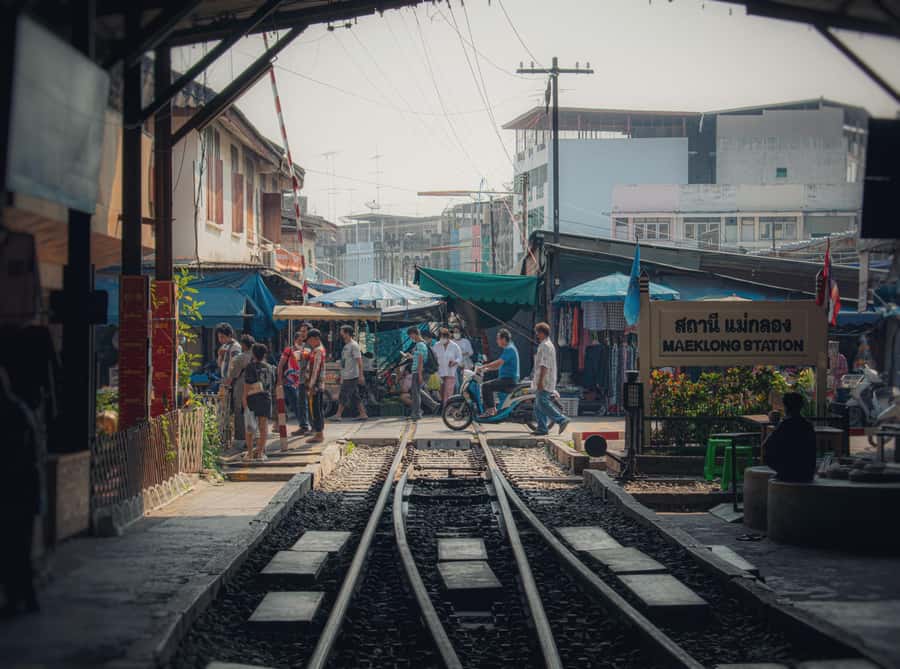 Bangkok: Maeklong Train Market & Floating Market Day Tour - Food, shopping and the real cost of the day