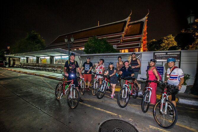 Bangkok: Night Bike Tour with Temples & Flower Market Visit - Pak Khlong Talat after dark