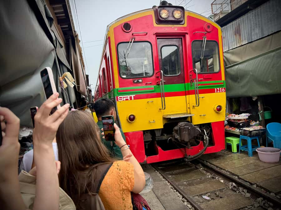 Bangkok: Private Floating Market and Train Market Experience - At Maeklong, watch the market fold around the train