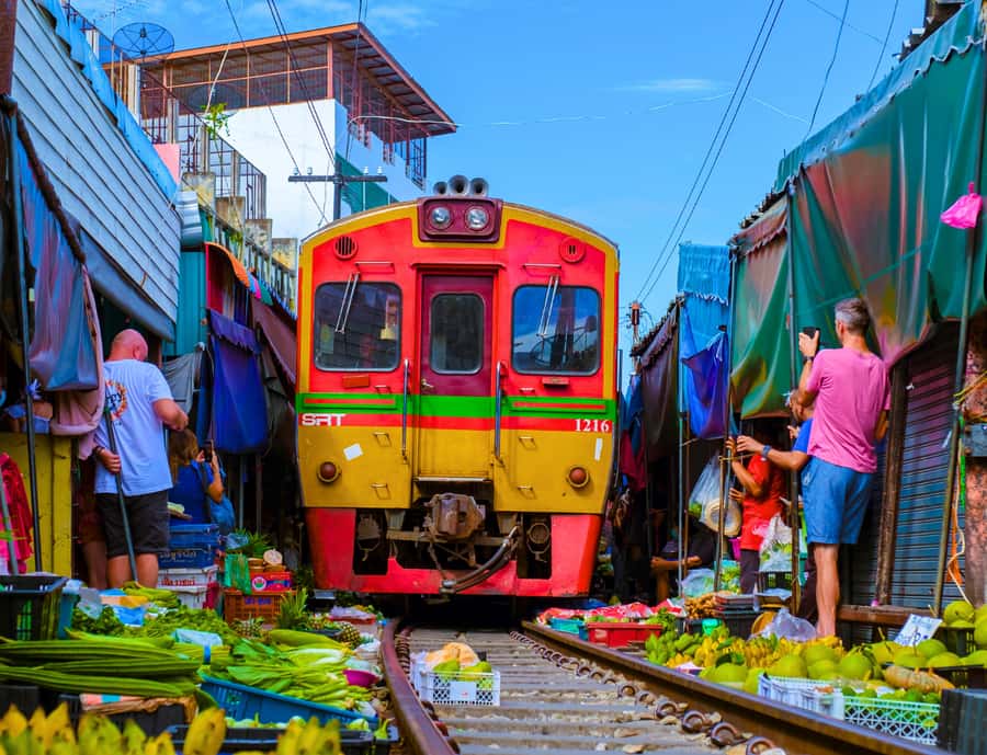Bangkok: Private Floating & Railway Markets with Farm Visits - Maeklong Railway Market and the train-track show