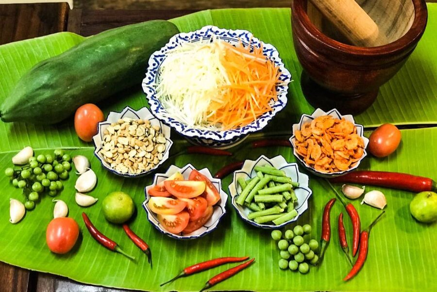 Bangkok: Thai Cooking Class and Onnuch Market Tour - Cooking four Thai dishes in one session