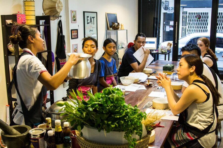 Bangkok: Thai Cooking Class and Onnuch Market Tour - Meeting the teacher at Pink Chili Thai Cooking School