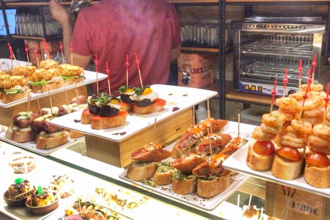 Barcelona Food Tour: Market & Gothic Quarter with Expert Guide - Pinchos and Patatas Bravas in the Gothic Quarter