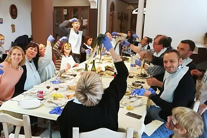 Barcelona : Paella Cooking Experience + Boqueria Market Exclusive Tour - A hands-on paella class with shared jobs