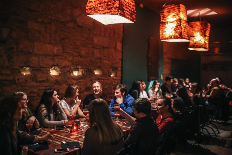 Barcelona: Paella Cooking Experience & Boqueria Market Tour - Building seafood paella as a group
