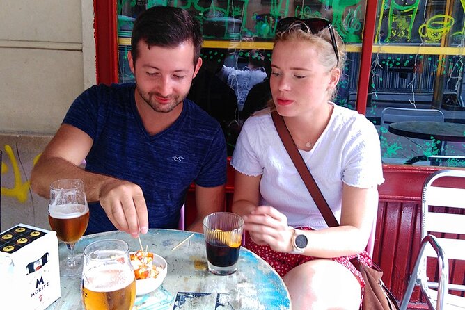 Barcelona Street Food Tour with Local Market & City Center Visit - Las Ramblas beyond the souvenir shops