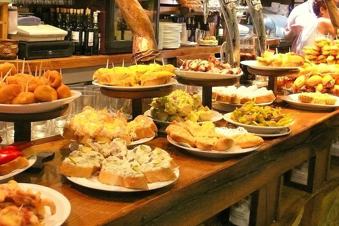 Boqueria & St Caterina Markets with Food & Tapas Small Group Tour - Who should book this Barcelona food walk?