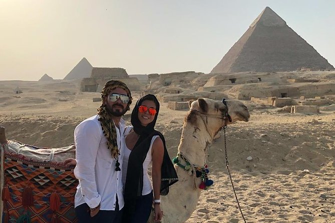 Cairo layover tour Giza pyramids Egyptian museum local bazaars Camel ride Lunch - Meeting your guide at Cairo airport