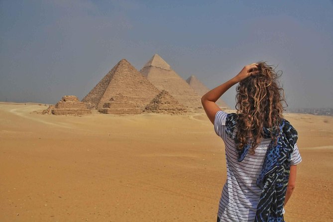 Cairo Layover Tour to Giza Pyramids Sphinx,Coptic Cairo & Old Bazaar - Lunch with a view, with one important qualification