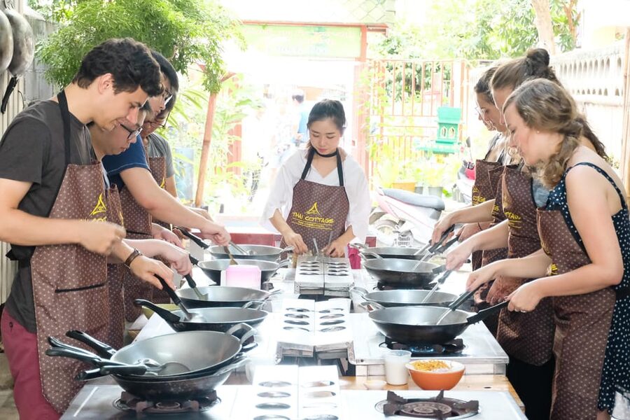 Chiang Mai: Cooking Class, Market & Thai Herbs Garden Tour - Making curry paste by hand is the main lesson