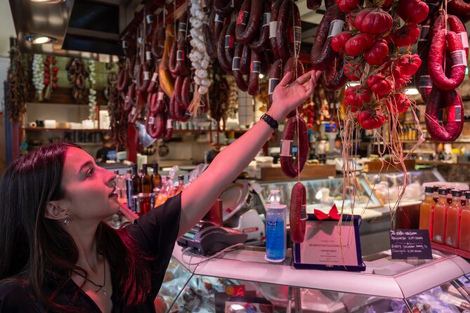Classic Athens Food Tour with Local Drink & Market Visit - A local restaurant and a taste of Greek spirits