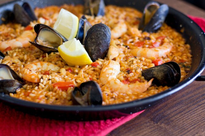 Cook Paella & Tapas + Market Tour in Barcelona (4-Course Meal) - Shopping for peppers, saffron, and seafood