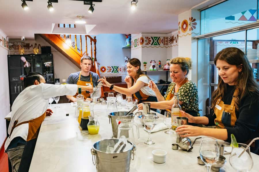 Cusco: Peruvian Cooking Class, Cocktails & Local Market Tour - Ceviche, causa limeña, and quinoa tamal