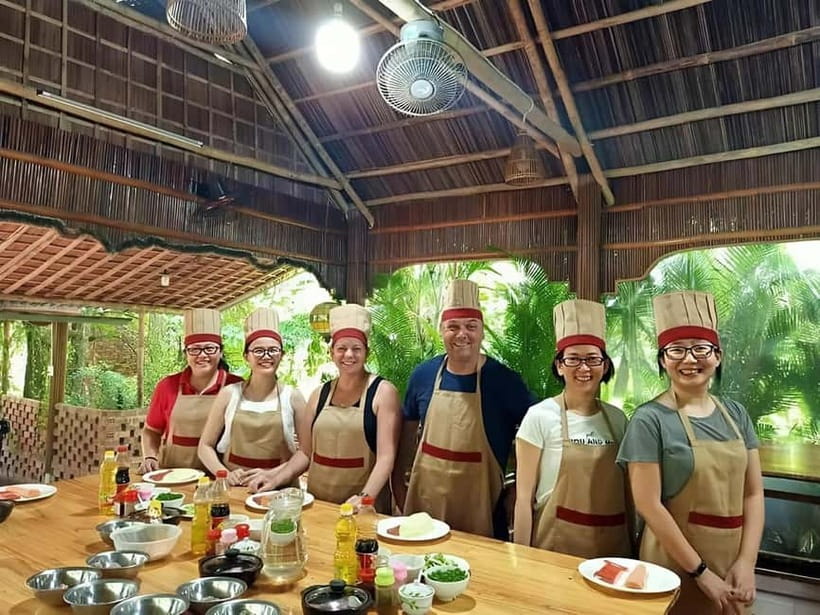 Da Nang/Hoi An: Market Tour, Basket Boat Ride, Cooking Class - Riding through Cam Thanh’s coconut forest