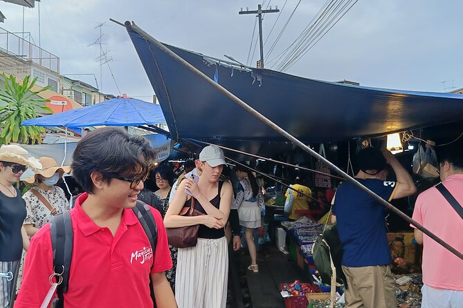 Damnoen Saduak and Maeklong Railway Market Tour with Private Car - Riverside lunch and a short market walk