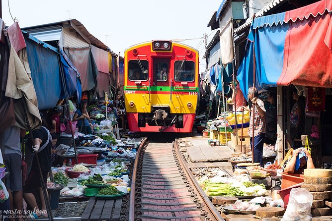 Damnoen Saduak Floating Market & Maeklong Train Market Tour - Riding into Maeklong Railway Market