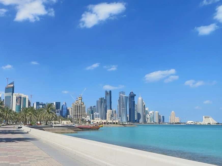 Doha: Souq Waqif - Traditional Local market guided Walk Tour - The Golden Thumb Statue: a simple start in central Doha