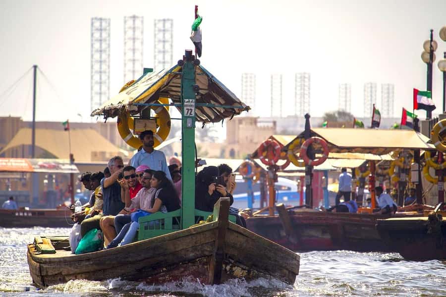 Dubai: City Tour of Creek, Souks, Frame, Burj Khalifa Entry - Crossing Dubai Creek by abra