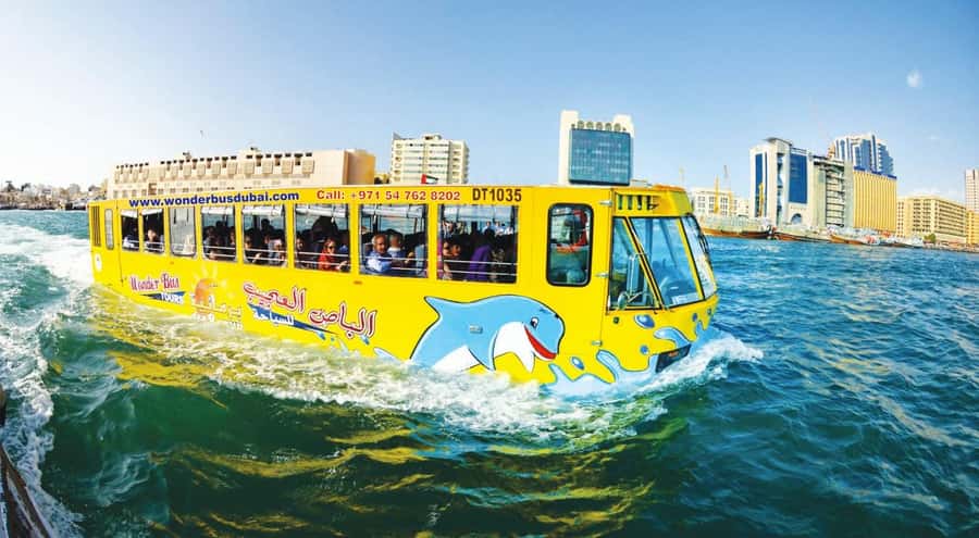 Dubai: Old town tour with Wonder Bus, souks, Creek and Guide - Al Fahidi Fort, the old markets, and heritage stops