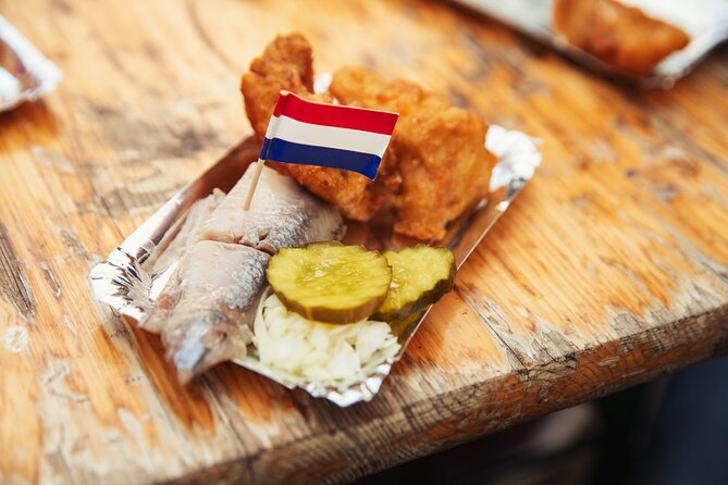 Eating Amsterdam: Albert Cuyp Market & The Pijp Food Tour - Starting with a saucijzenbroodje at Simon Meijssen
