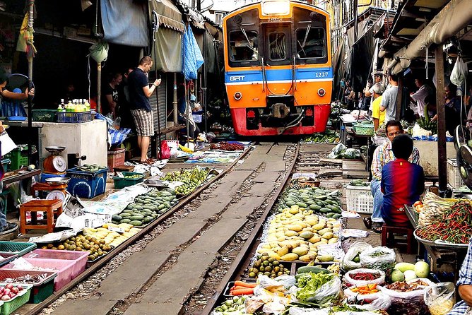 Famous Markets Tour: Maeklong Railway & Damnoen Saduak Floating - Damnoen Saduak by long-tail boat