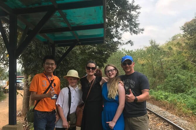 Floating and Railway Markets and Erawan Waterfall (Group Tour) - Coconut nectar at a working farm