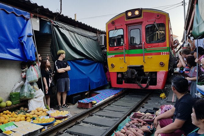 Floating Market Damnoen Saduak and Meklong Railway Market: Half Day Tour - Damnoen Saduak by traditional paddle boat