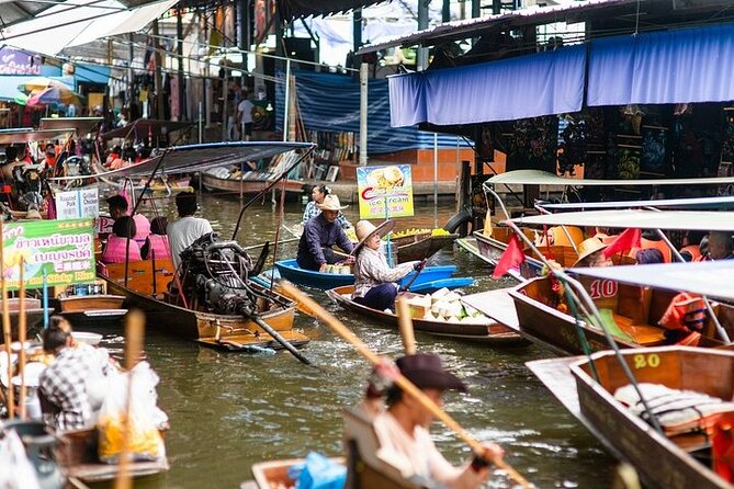 Floating Market & Railway Market near Bangkok - Maeklong Railway Market and the passing train