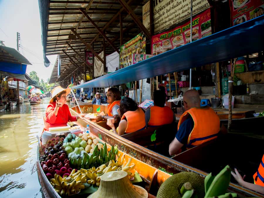 From Bangkok: Private Railway and Floating Market Tour - Reaching Damnoen Saduak by village canal