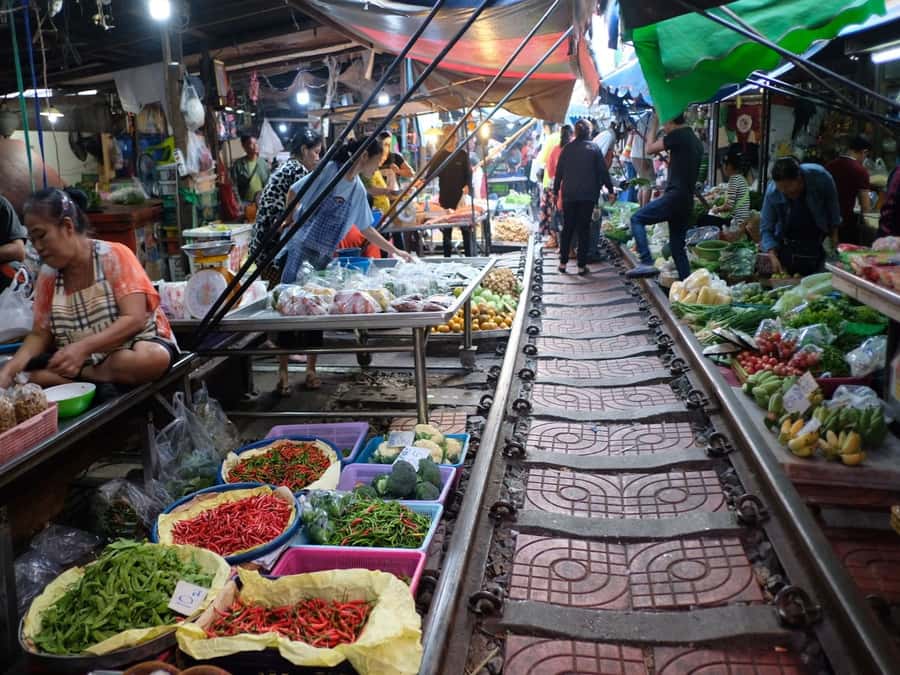 From Bangkok: Private Railway and Floating Market Tour - Food, shopping, and what to budget