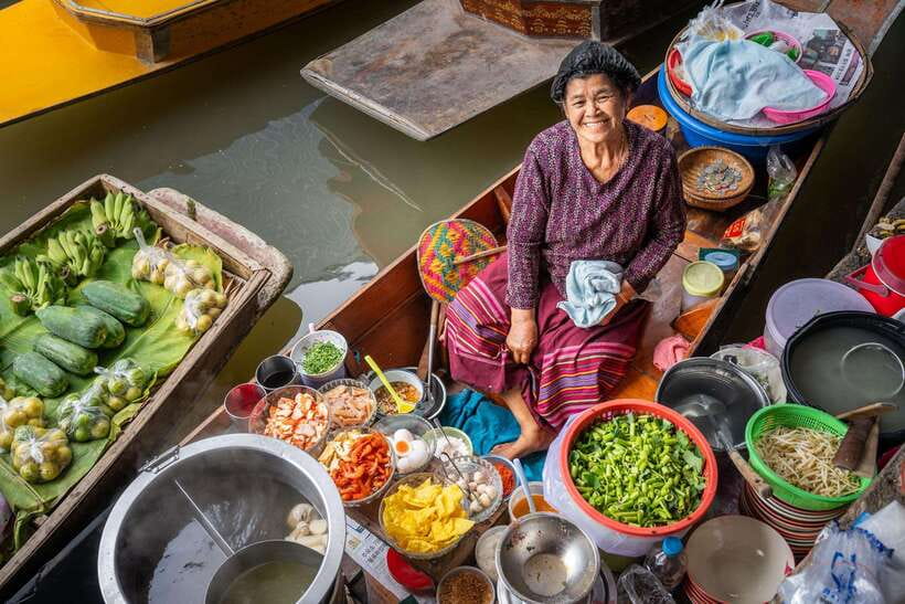 From Bangkok: Railway & Damnoen Saduak Floating Market Tour - Trading rails for canals at Damnoen Saduak