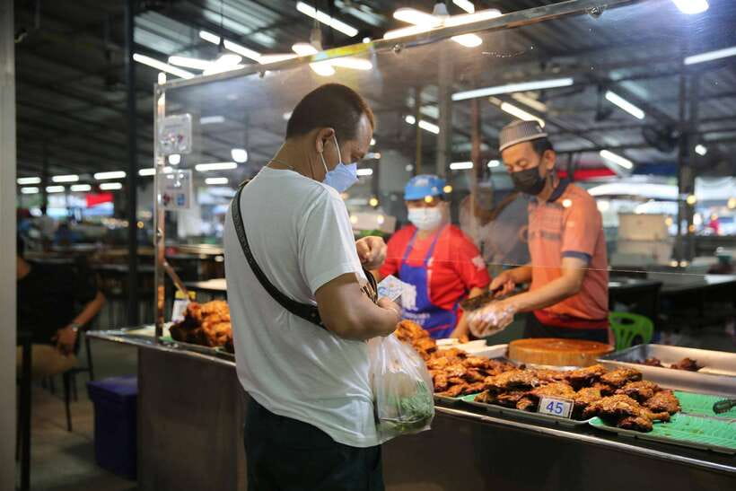 From Khao Lak: Phuket Naka Weekend Market - Entering Naka Weekend Market after dark