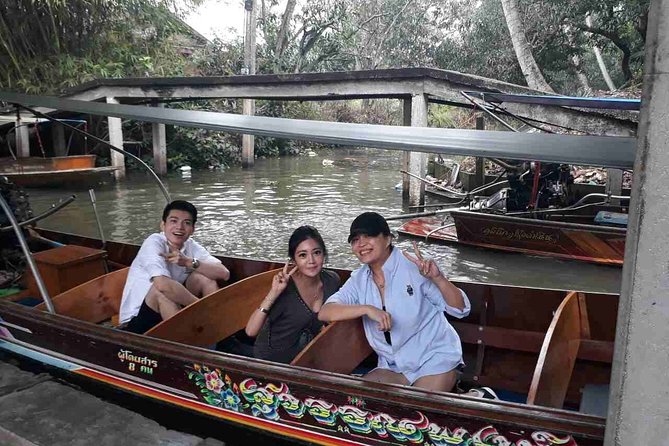 Full-Day Floating Market and Maeklong Railway Market Private Tour from Bangkok - A long-tail boat through Damnoen Saduak
