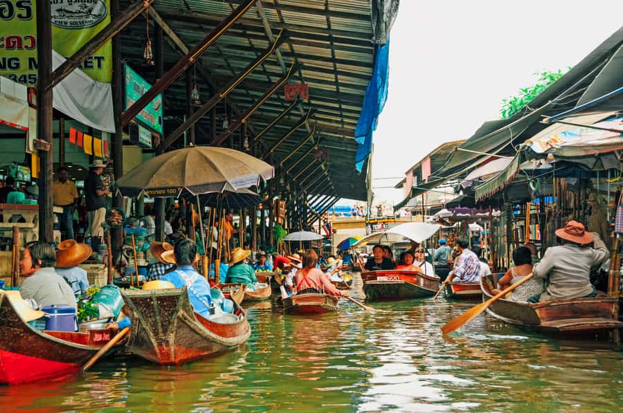 Grand Palace, Damnoen Floating Market & Maeklong Market Tour - Maeklong Railway Market and the train that cuts through it
