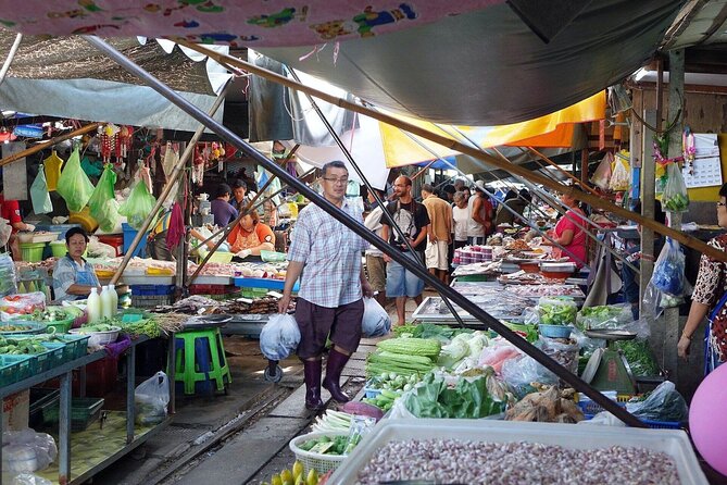 Half Day Railway Market and Damnoen saduak Floating Market tour - Guide support and group size